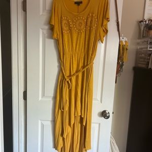 Deep yellow hi lo dress with tie around the waste.